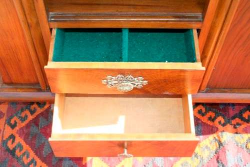 An incredible antique Art Deco double-door buffet cabinet with two drawers and stylish handles
