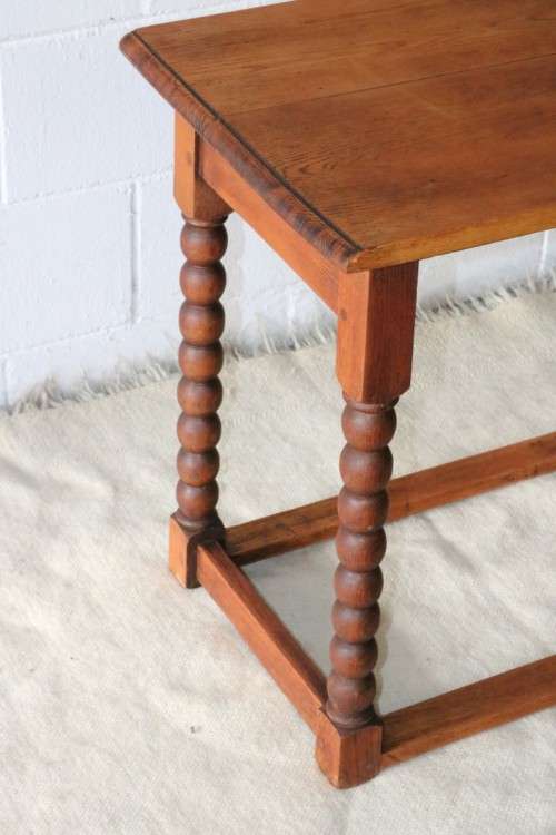 A gorgeous and stylish vintage solid Oak occasional coffee table with turned bobbin legs