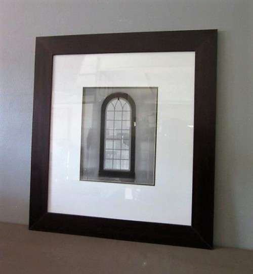 **RS17** A (large) black and white photograph of a "window" in a complimentary broad-border frame