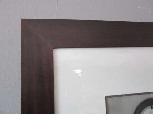 **RS17** A (large) black and white photograph of a "window" in a complimentary broad-border frame