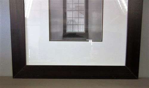 **RS17** A (large) black and white photograph of a "window" in a complimentary broad-border frame