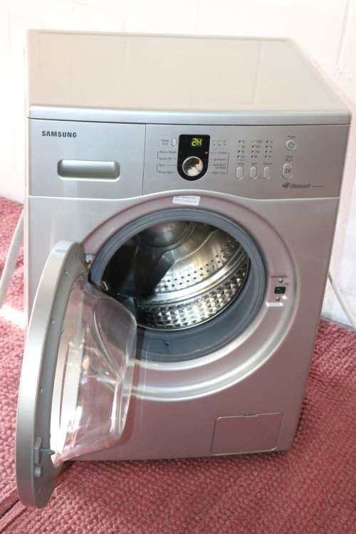 A superb silver Samsung (WF8500NHS) electronic front loader washing machine - fully working!
