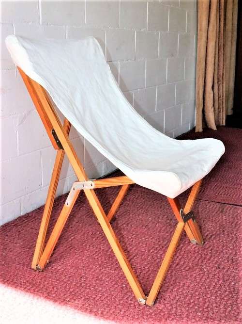 A fantastic modern "Tripolina Butterfly" folding chair w a removable slipcover - stylish & practical