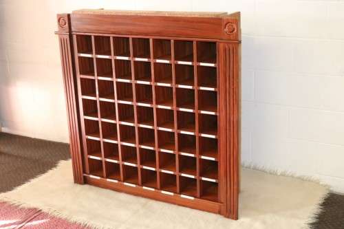 An awesome 49 bottle (floor cabinet) wine rack with individual wine bottle slots and sections