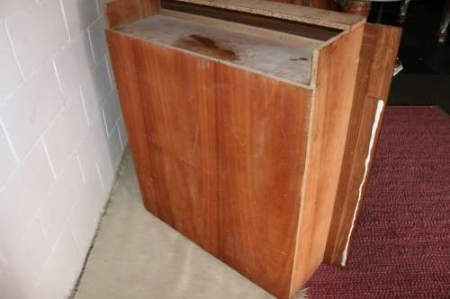An awesome 49 bottle (floor cabinet) wine rack with individual wine bottle slots and sections