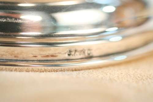 An exquisite vintage "EMESS" silver plated tureen with a slotted lid and beautiful ornate handles