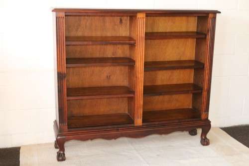 A magnificent vintage solid Imbuia ball and claw bookcase w ample shelf space - perfect for a study!