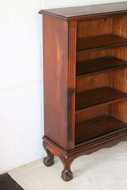 A magnificent vintage solid Imbuia ball and claw bookcase w ample shelf space - perfect for a study!