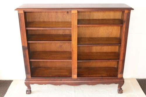 A magnificent vintage solid Imbuia ball and claw bookcase w ample shelf space - perfect for a study!