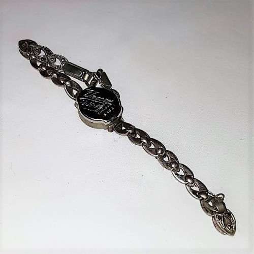A fabulous vintage Swiss made Olma 17-Jewel Incabloc Art Deco wrist watch w/ Marcasite stones