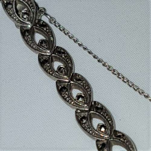 A fabulous vintage Swiss made Olma 17-Jewel Incabloc Art Deco wrist watch w/ Marcasite stones