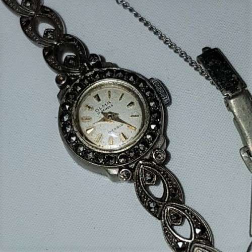 A fabulous vintage Swiss made Olma 17-Jewel Incabloc Art Deco wrist watch w/ Marcasite stones