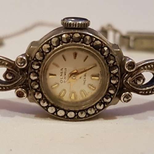 A fabulous vintage Swiss made Olma 17-Jewel Incabloc Art Deco wrist watch w/ Marcasite stones