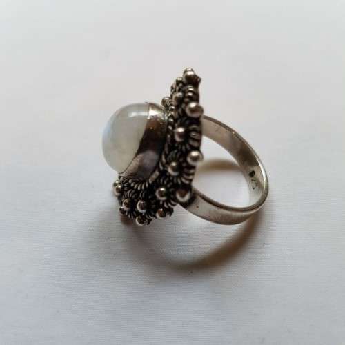 An exquisite "filigree" detailed sterling silver (925) ladies ring with a gorgeous oval moonstone