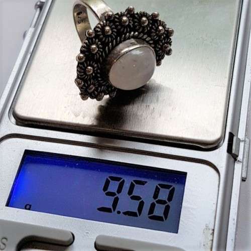 An exquisite "filigree" detailed sterling silver (925) ladies ring with a gorgeous oval moonstone