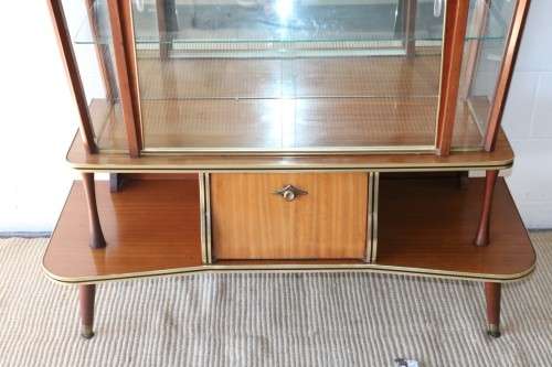 An amazing vintage c1970's Retro display cabinet with double glass sliding doors & glass shelves