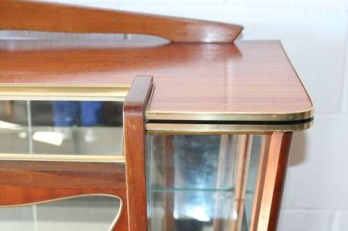 An amazing vintage c1970's Retro display cabinet with double glass sliding doors & glass shelves