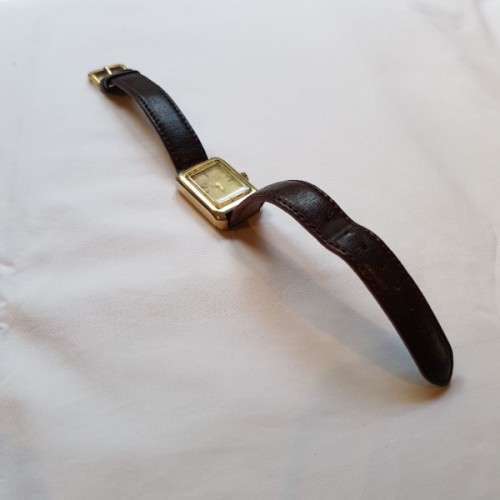 An awesome vintage "Bulova Accutron" ladies gold plated wrist watch with a leather strap