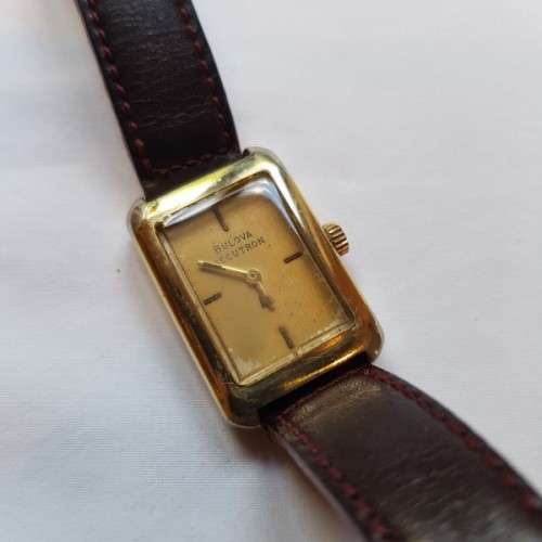 An awesome vintage "Bulova Accutron" ladies gold plated wrist watch with a leather strap