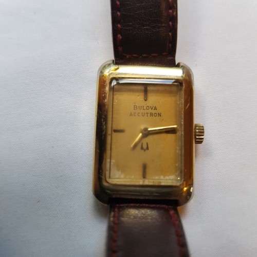An awesome vintage "Bulova Accutron" ladies gold plated wrist watch with a leather strap