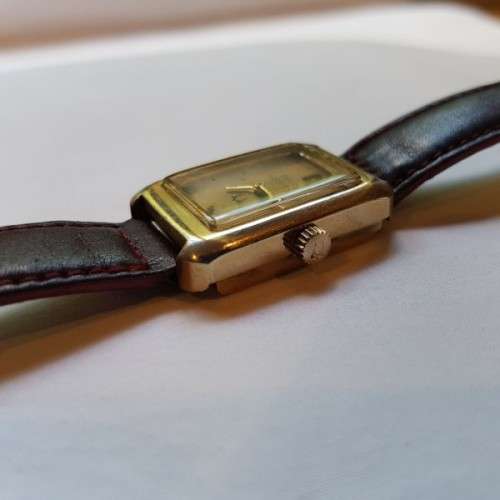 An awesome vintage "Bulova Accutron" ladies gold plated wrist watch with a leather strap
