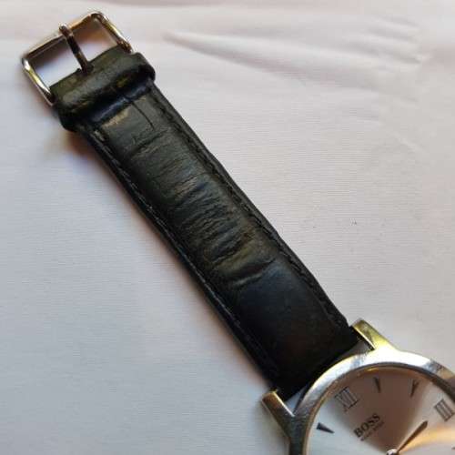 A stunning classic "Hugo Boss" model 1610 gents stainless steel wrist watch with a leather strap