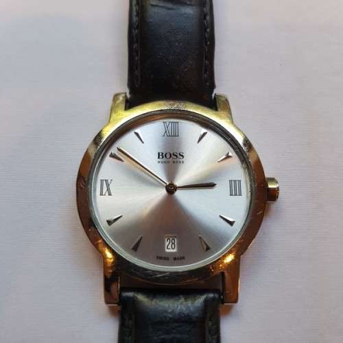 A stunning classic Hugo Boss model 1610 gents stainless steel wrist watch with a leather strap bobshop .za