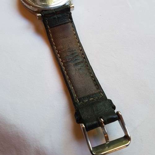A stunning classic "Hugo Boss" model 1610 gents stainless steel wrist watch with a leather strap