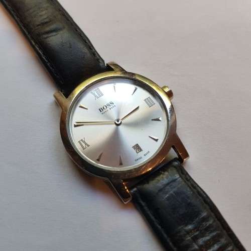 A stunning classic "Hugo Boss" model 1610 gents stainless steel wrist watch with a leather strap