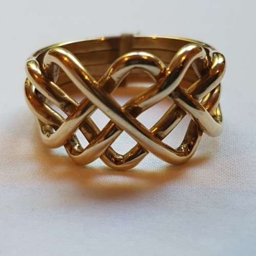 An incredible 14ct yellow gold ladies 4-band "puzzle" ring in its presentation box = stunning!!!