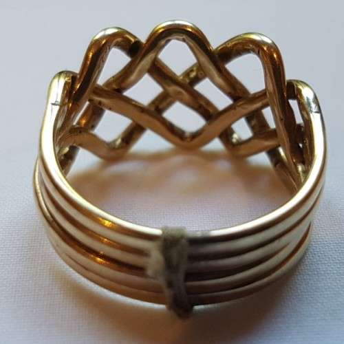 An incredible 14ct yellow gold ladies 4-band "puzzle" ring in its presentation box = stunning!!!