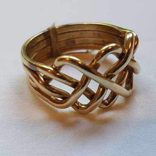An incredible 14ct yellow gold ladies 4-band "puzzle" ring in its presentation box = stunning!!!