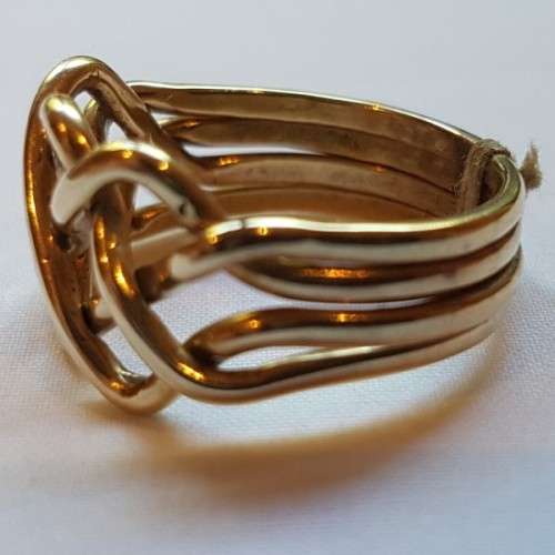 An incredible 14ct yellow gold ladies 4-band "puzzle" ring in its presentation box = stunning!!!