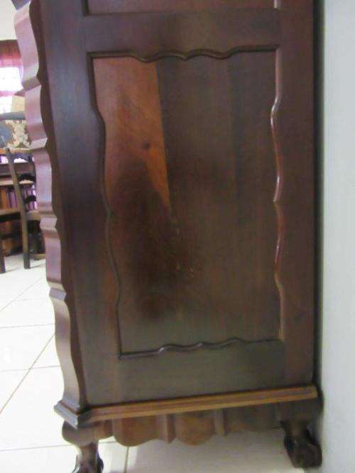 An amazing gabled double-door solid Imbuia ball & claw wardrobe w/ solid brass embellishments