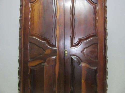 An amazing gabled double-door solid Imbuia ball & claw wardrobe w/ solid brass embellishments