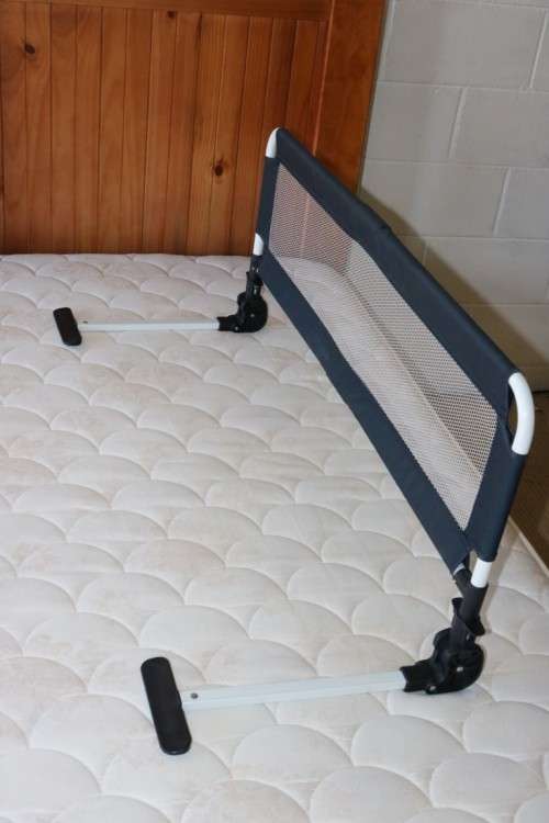A practical and useful "Chelino Sleep Safe" toddler bed guard in good condition