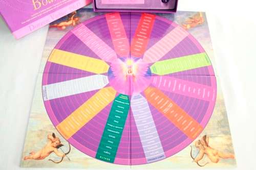 A boxed "Angel Guidance Board" by Doreen Virtue including folding board,crystal dice and booklet