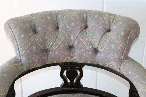 A superb antique Edwardian upholstered library armchair on its original castors - amazing!