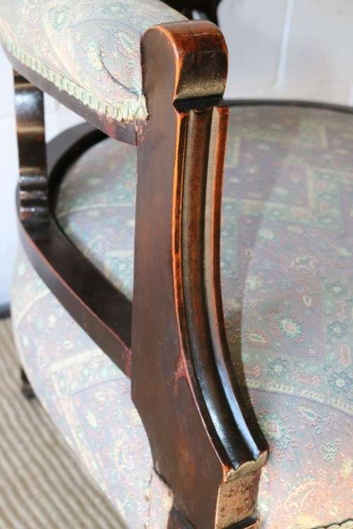 A superb antique Edwardian upholstered library armchair on its original castors - amazing!