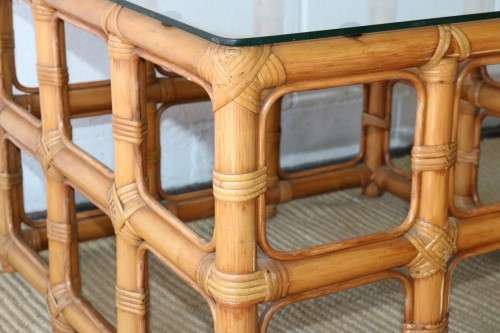 A lovely cane occasional/ coffee table with a removable glass top - stunning in a holiday home