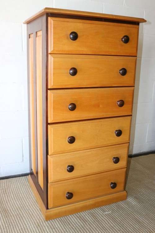 A fantastic tall solid yellowwood and imbuia "tallboy" chest of drawers in stunning condition