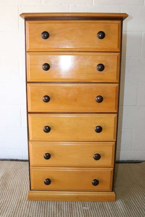 A fantastic tall solid yellowwood and imbuia "tallboy" chest of drawers in stunning condition