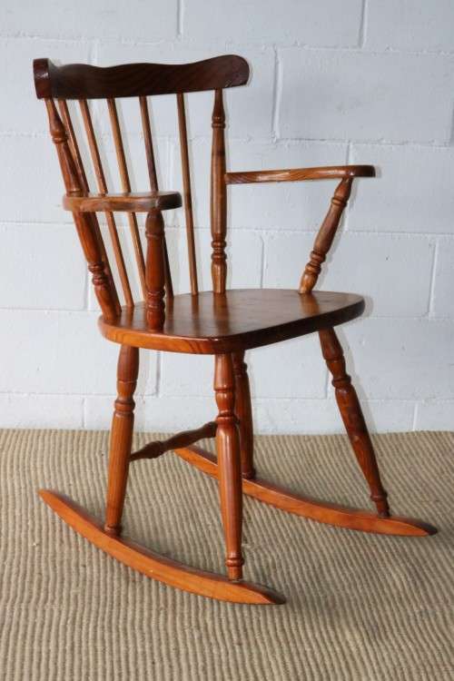 A lovely sturdy wooden rocking chair - gorgeous in a baby room or on a patio - RS17Sale
