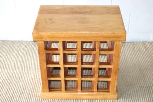 A fabulous 16 bottle solid Oak wine rack with individual wine bottle slots in excellent condition!