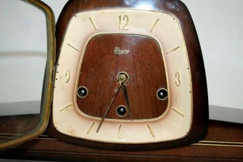 An incredibly vintage German "Urgos" Westminster chime mantle clock w/ balance wheel movement RS17CL