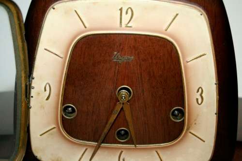 An incredibly vintage German "Urgos" Westminster chime mantle clock w/ balance wheel movement RS17CL