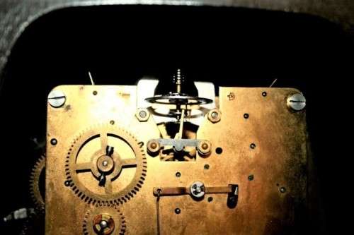 An incredibly vintage German "Urgos" Westminster chime mantle clock w/ balance wheel movement RS17CL