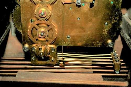 An incredibly vintage German "Urgos" Westminster chime mantle clock w/ balance wheel movement RS17CL