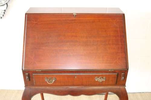 A remarkable vintage Mahogany "Regency" Queen Anne fall-top writing bureau with a large drawer