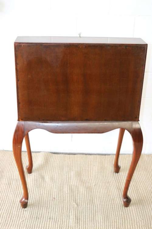 A remarkable vintage Mahogany "Regency" Queen Anne fall-top writing bureau with a large drawer